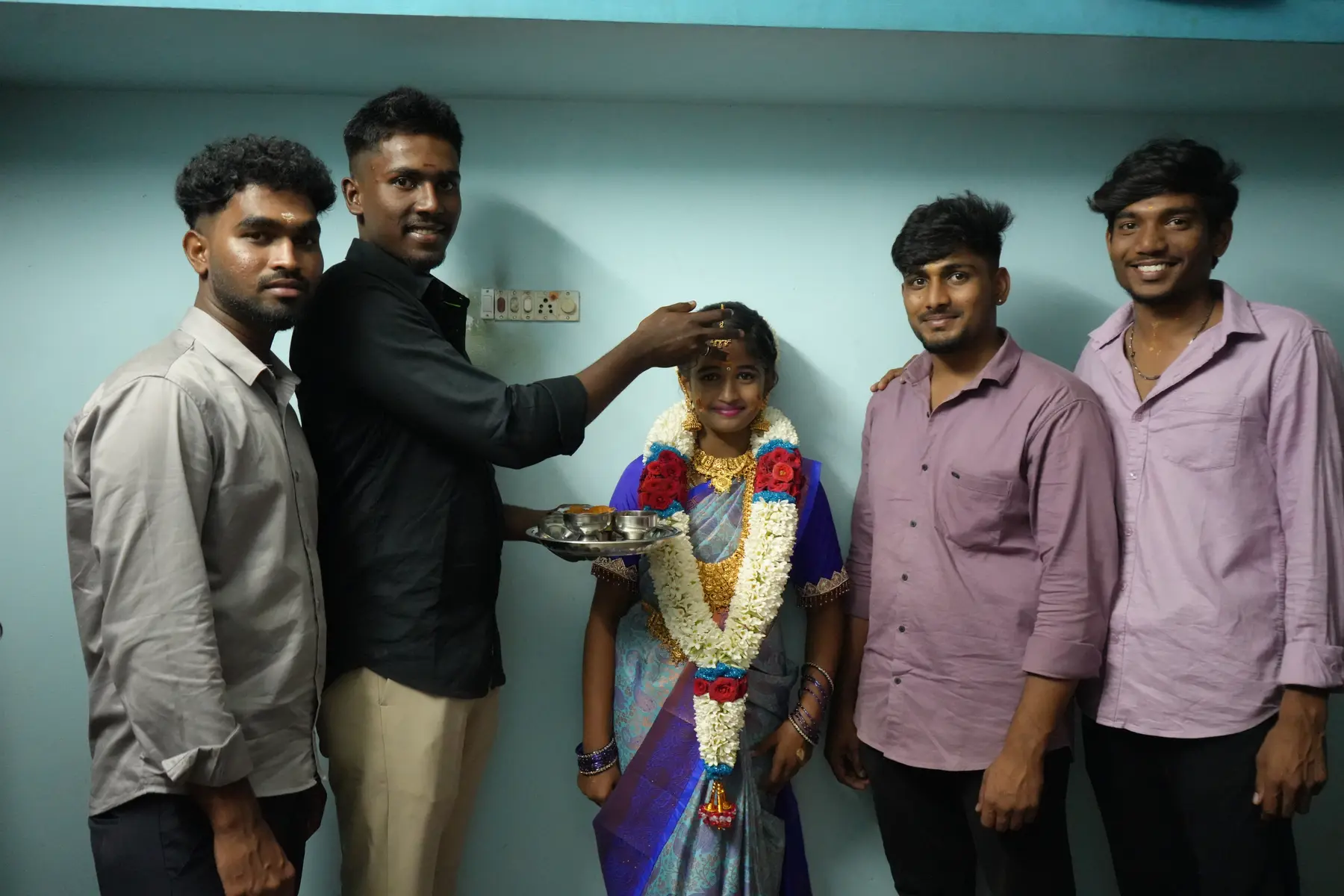 Traditional ritual photographed during a family function